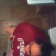 A fat girl wearing glasses and playing with her mobile phone is secretly recorded from a above the toilet. Audio is muffled, but you can see that she took a shit when she wipes and stands up. Over 2 minutes.